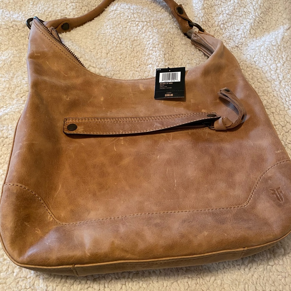 Beautiful Frye purse, never used, I paid the price it shows 398.